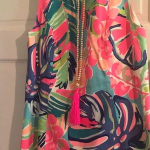 Lily Pulitzer dress with matching lily necklace